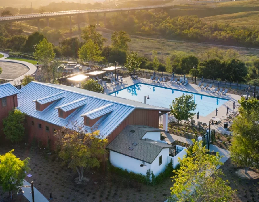 Aerial view of pool and building.